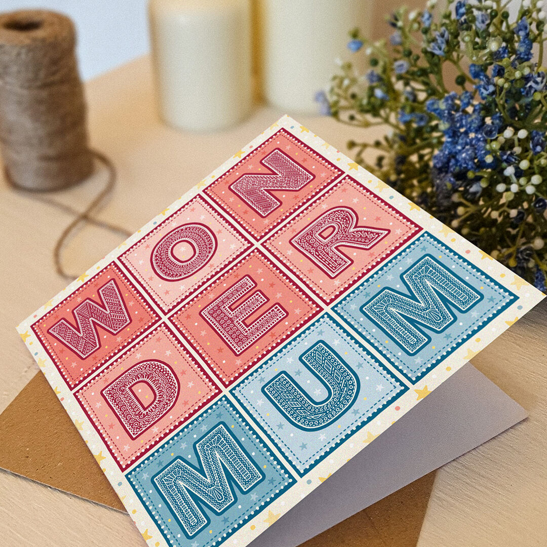 red and blue wonder mum superhero mother's day card with yellow stars
