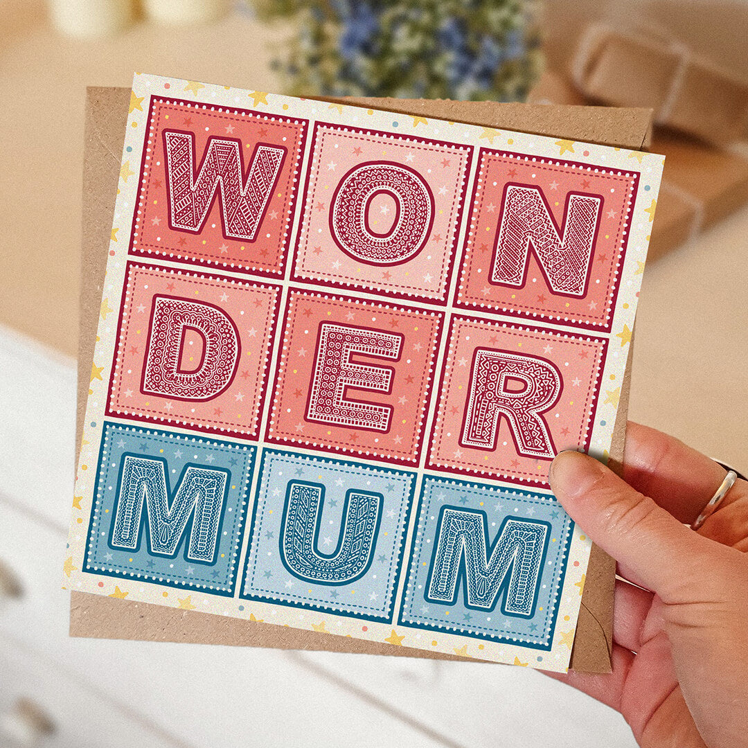 red and blue wonder mum superhero mother's day card with kraft brown envelope