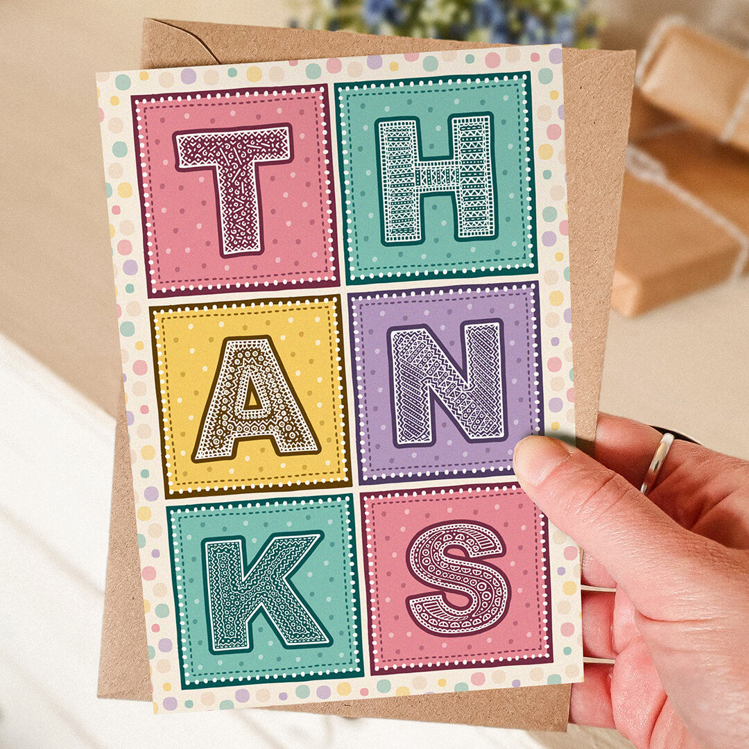Pink turquoise and yellow typographic thank you card multipack Pack of bright and colourful thank you cards Printed on FSC-certified card with kraft brown recycled envelopes Blank inside