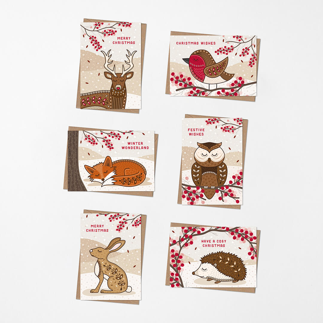 Set of six Christmas cards with forest animal illustrations on a white background