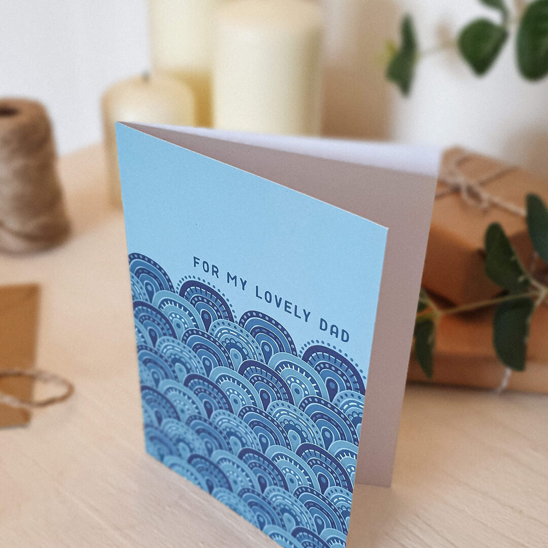 blue seaside-themed father's day card featuring unique geometric pattern and 'for my lovely dad' message