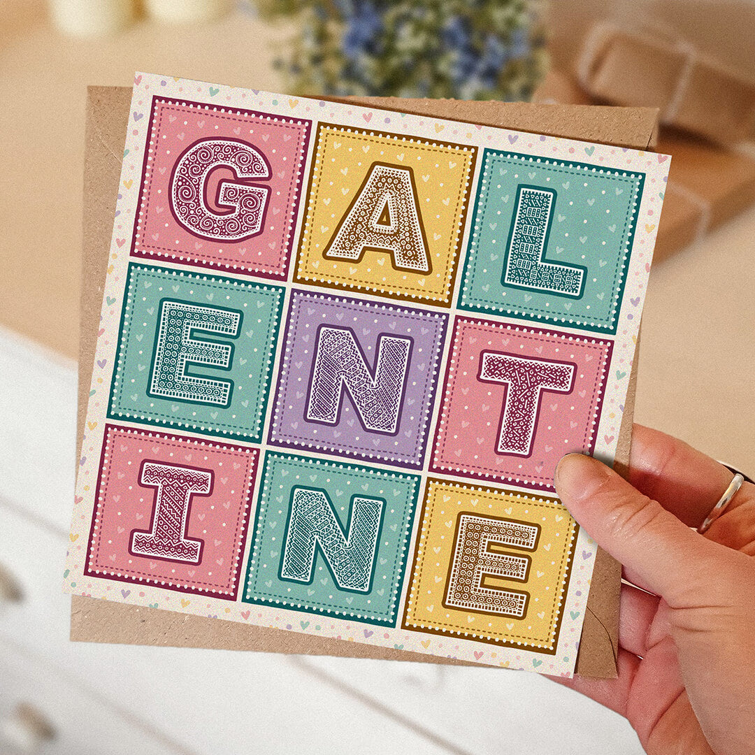 Hand holding cute pastel love hearts Galentine's Day card Unique typographic Galentine's day card Printed on FSC-certified card with kraft brown recycled envelope Blank inside