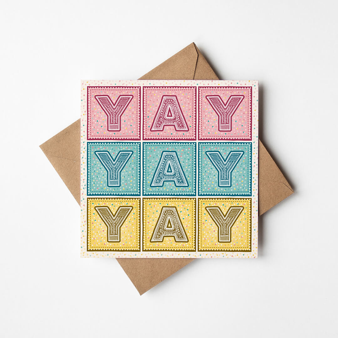 pastel pink blue and yellow congratulations card with detailed typography spelling yay yay yay