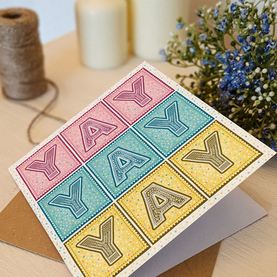 yay congratulations card in pretty pastel shades of pink blue and yellow supplied with recycled kraft brown envelope