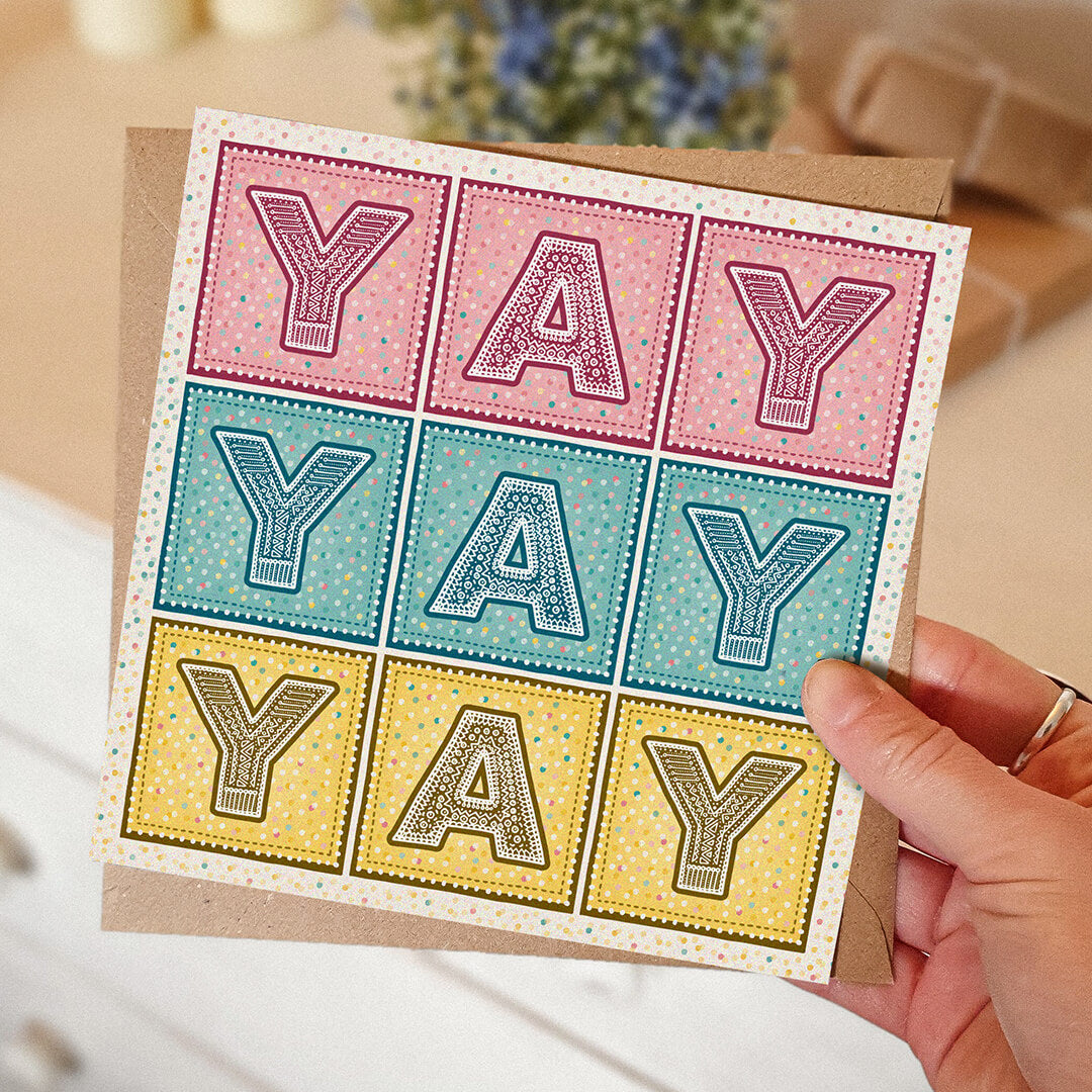 pink blue and yellow yay congratulations card supplied with kraft brown recycled envelope