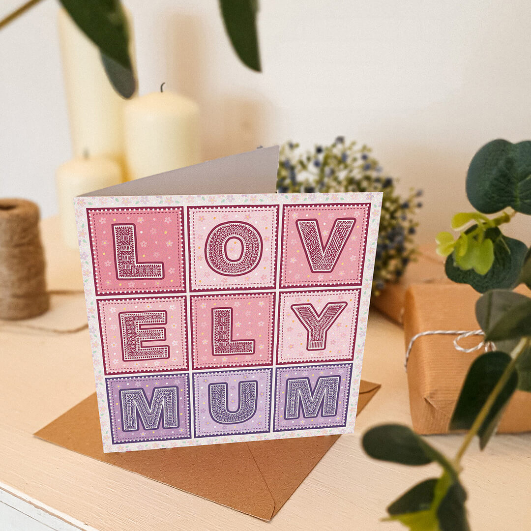 pink and lilac lovely mum mothers day card featuring detailed typography and floral illustrations