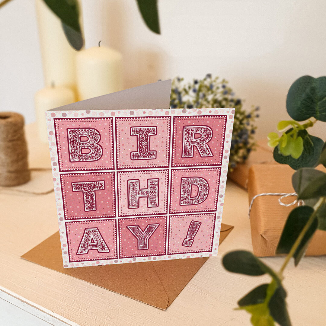 Pink typographic birthday card for friends and family Unique typographic birthday cards featuring fun and colourful design Printed on FSC-certified card with a kraft brown recycled envelope Blank inside