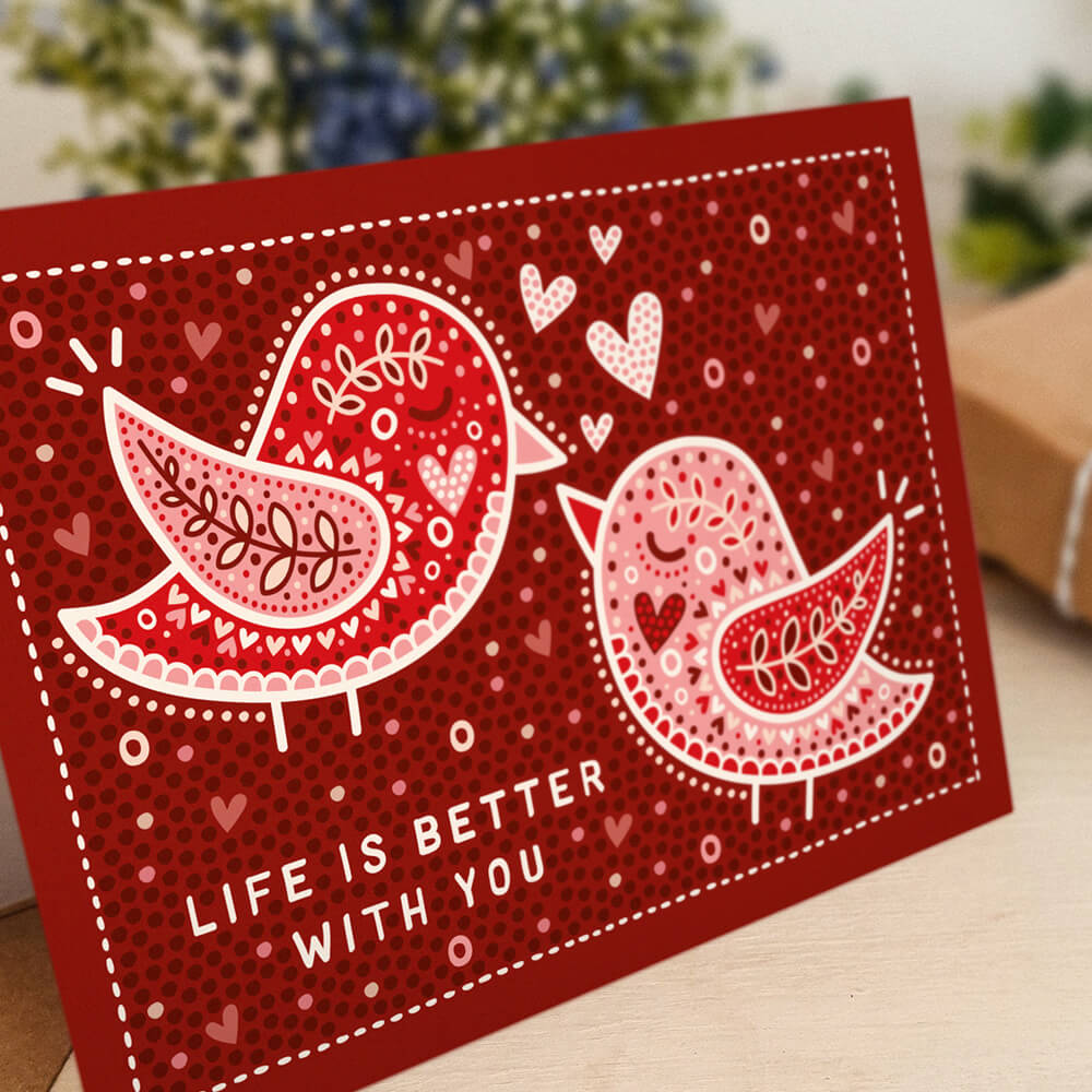 cute anniversary card featuring red lovebirds illustration perfect for husband or wife. Supplied with recycled envelope. Blank inside