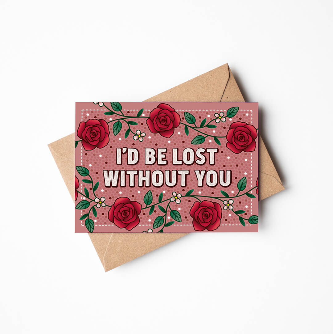 romantic red roses anniversary card featuring i'd be lost without you message surrounded by rose illustrations blank inside recycled kraft brown envelope