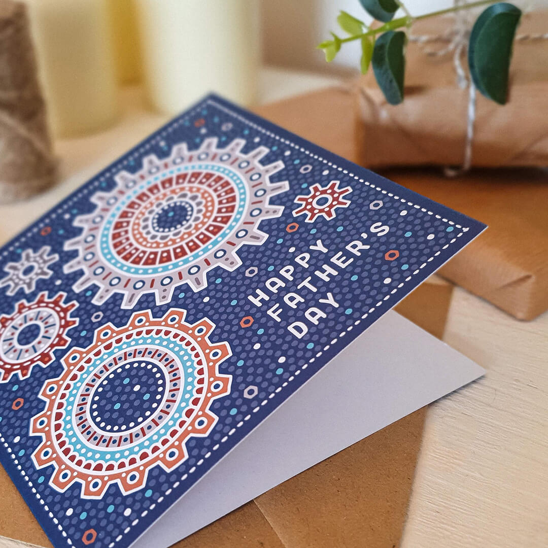 Mechanical Happy Father's Day card in bright blue featuring cog and mechanical illustrations and 'happy father's day' message