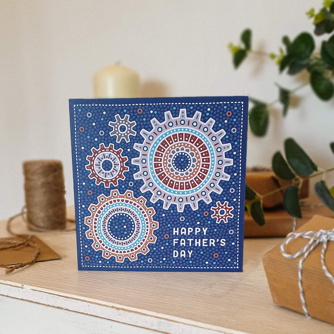 Blue mechanical Happy Father's Day card for mechanics and engineers featuring cog illustrations and supplied with a recycled kraft brown envelope