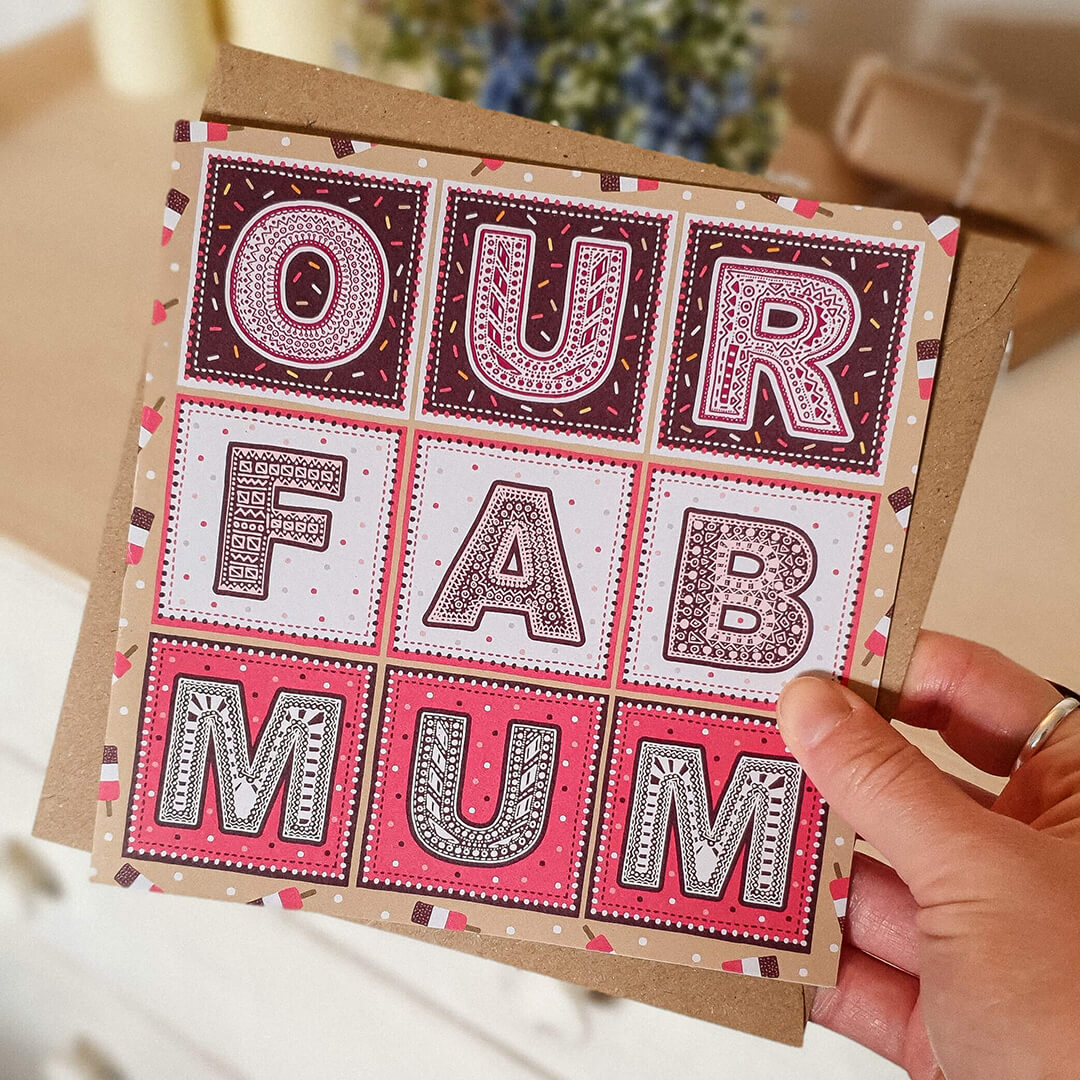 Hand holding Our Fab Mum Mother's Day card from child Unique typographic design for fun Mums Printed on recycled card Supplied with kraft brown recycled envelope