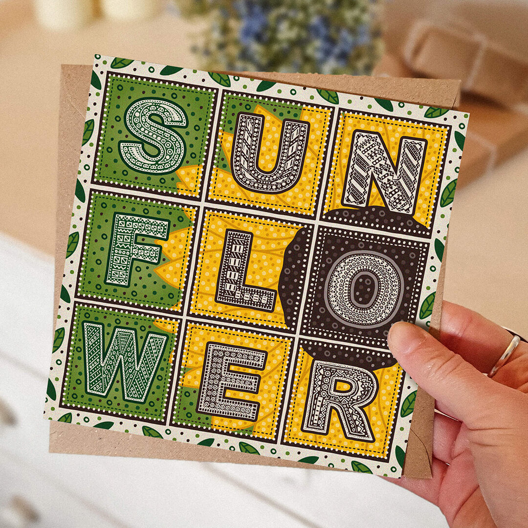 Hand holding sunflower card Unique floral greeting card design Printed on recycled card Supplied with kraft brown recycled envelope
