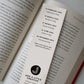 lifestyle shot showing back of 2024 unique bookmark featuring list of useful 2024 dates with space to write your own Printed on recycled card