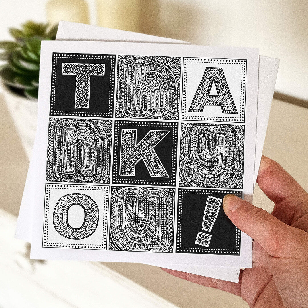 hand holding unique thank you card Black and white typographic thank you card Blank inside