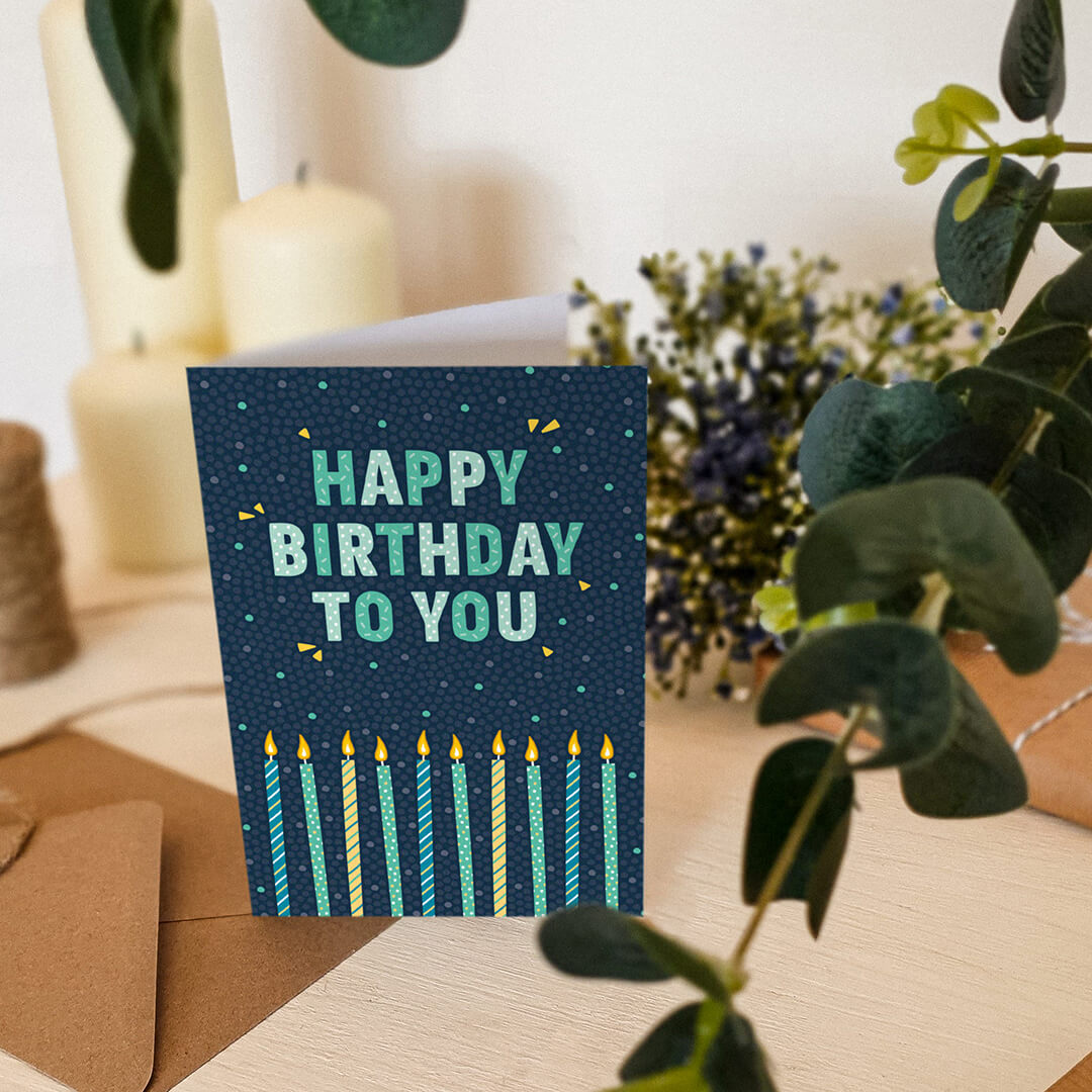 fun typographic birthday card for men Unique blue and green birthday candles card Printed on FSC-certified card and supplied with a kraft brown recycled envelope