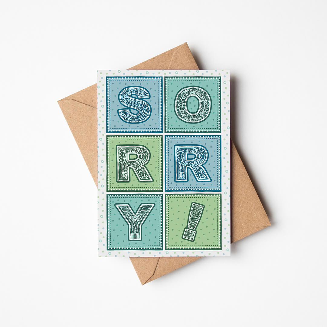 Blue and green typographic sorry card Printed on FSC-certified card Blank inside