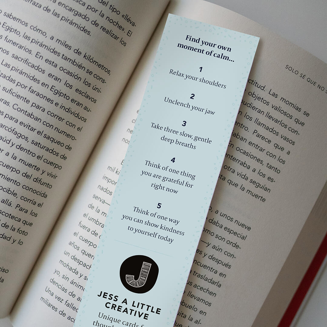 lifestyle shot showing back of mindfulness bookmark Printed on recycled card