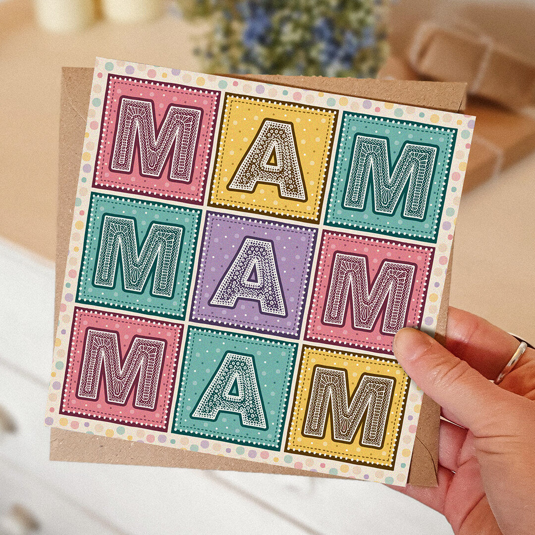 Unique Mother's Day card with colourful 'MAM' message held by a hand