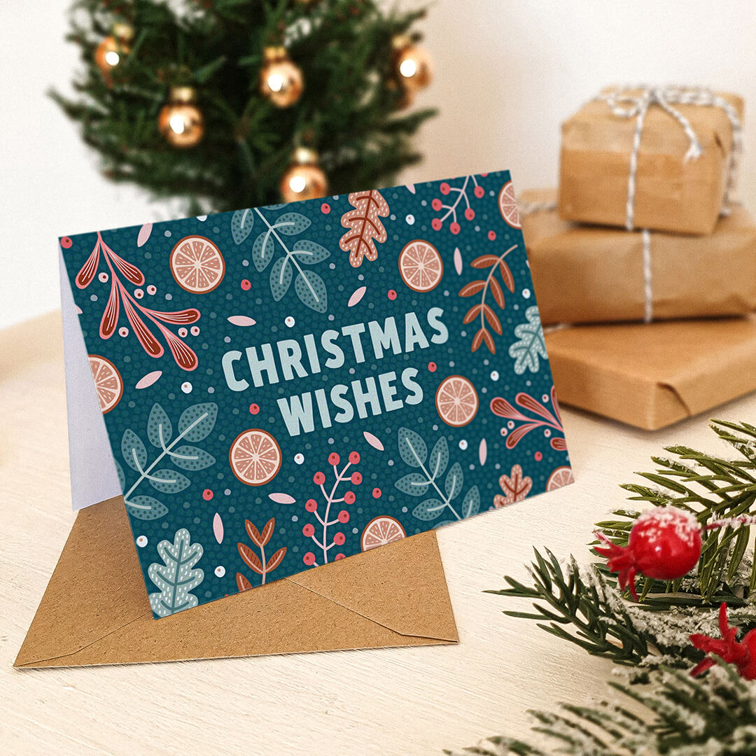 Unique dark blue nature Christmas card featuring winter plant illustrations Kraft Brown recycled envelope