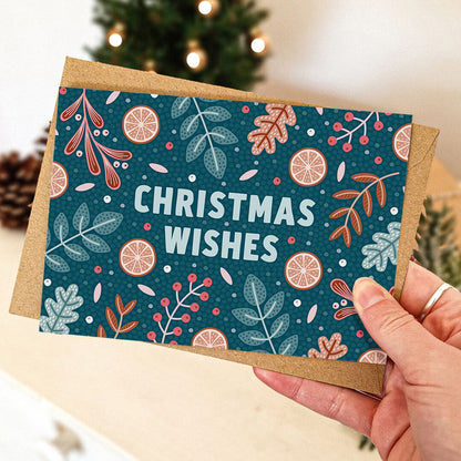 dark blue botanical Christmas card with Christmas Wishes message Part of festive botanical christmas card multipack Blank inside Supplied with kraft brown recycled envelopes