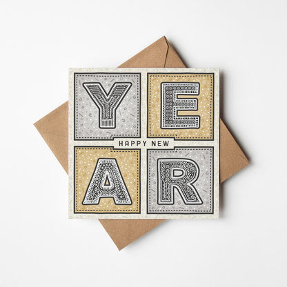 Unique New Year card with 'Happy New Year' message on a white background
