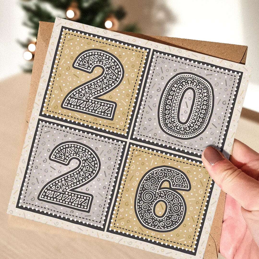 Hand holding gold and silver 2026 New Year card Modern unique New Year card Printed on FSC-certified card with kraft brown recycled envelope Blank inside