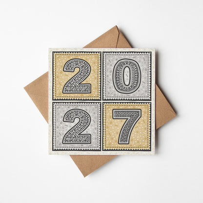 unique gold and silver 2027 new year card with recycled kraft brown envelope