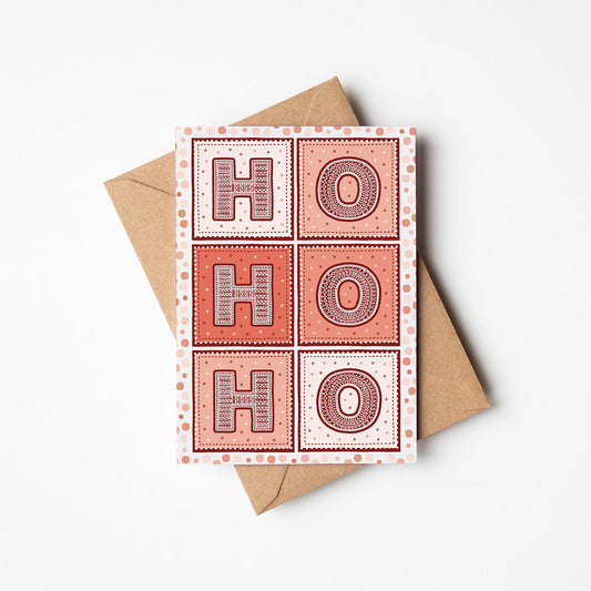 Red Ho Ho Ho Christmas card with 'HO HO HO' design on a white background