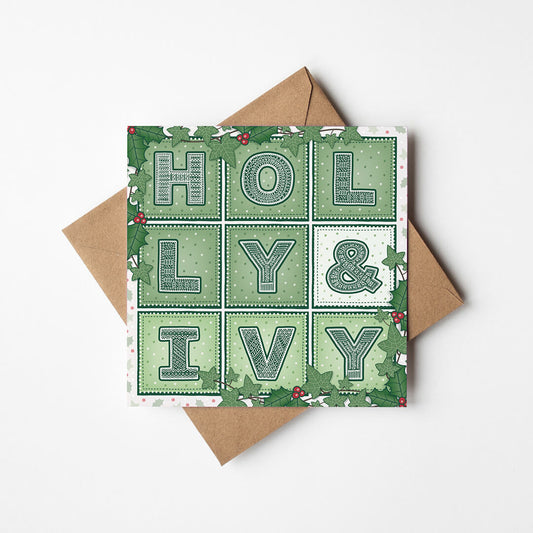 Holly & Ivy Christmas card with 'Holly & Ivy' typography and botanical illustrations on a white background