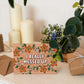 orange floral apology card with I really messed up message blank inside recycled kraft brown envelope