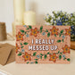 orange floral apology card with I Really Messed Up message blank inside recycled kraft brown envelope