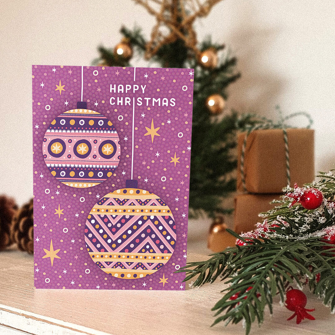 Pink Christmas card with bauble illustrations Modern contemporary Christmas card design Printed on recycled card Kraft brown recycled envelope