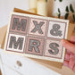 Mx and mrs non gendered wedding card in pink and cream colour scheme For female and non-binary couple getting married Printed on FSC-certified card and supplied with a recycled envelope