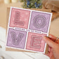 Hand holding pink and lilac thinking of you card Unique sending you so much love card Printed on fsc-certified card Supplied with kraft brown recycled envelope