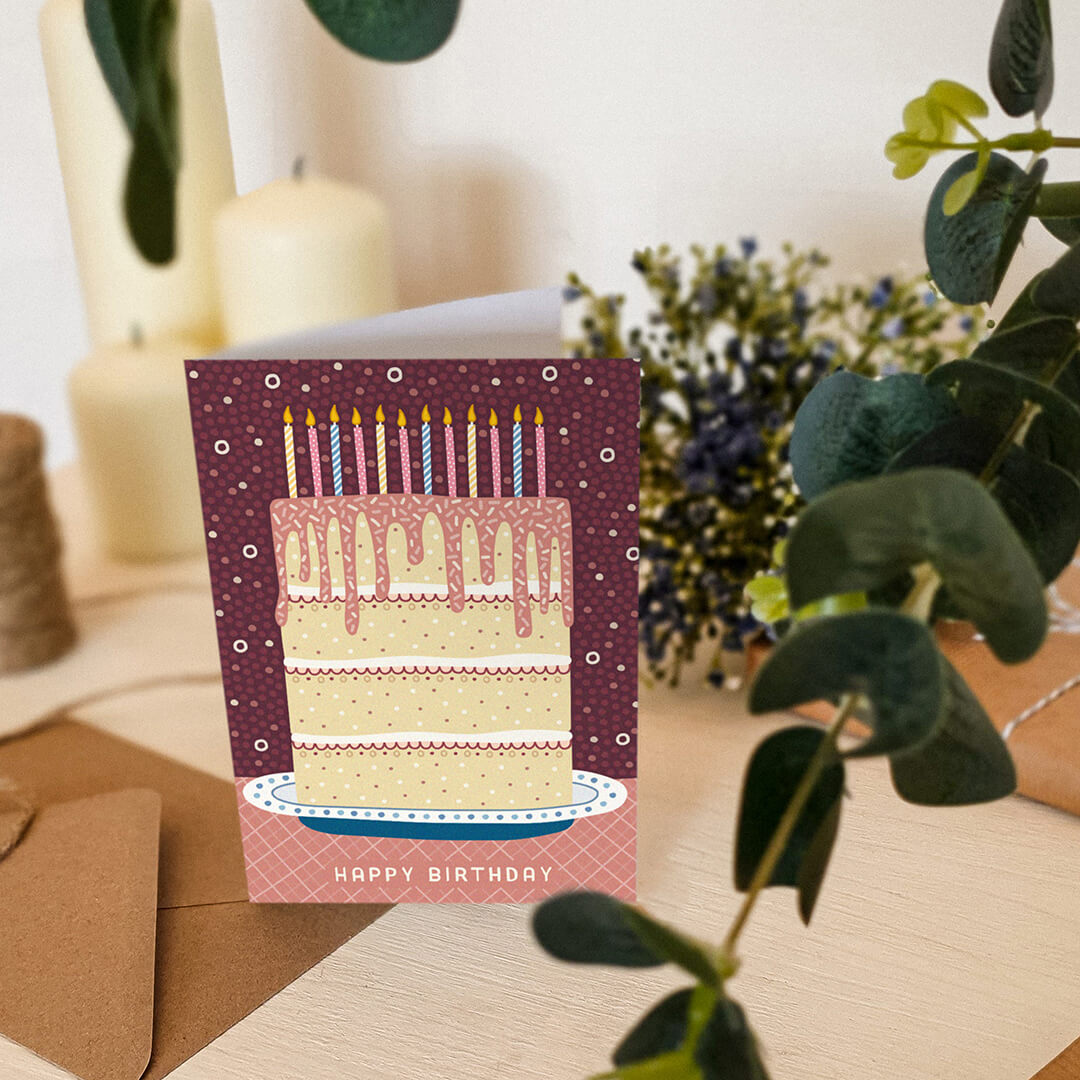 Illustrated cake birthday card Kraft Brown recycled envelope Pink unique cake illustration with icing and candles for friend's birthday