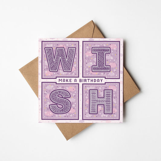 Purple birthday card with 'Make a Birthday Wish' text and a recycled brown envelope