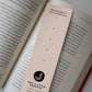 lifestyle shot of the back of a unique reading list bookmark with space to write Printed on recycled card