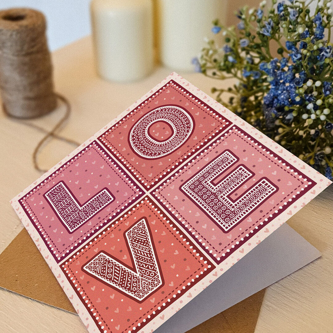 Typographic Love anniversary card Kraft Brown recycled envelope Printed on fsc-certified card Unique red and pink anniversary card