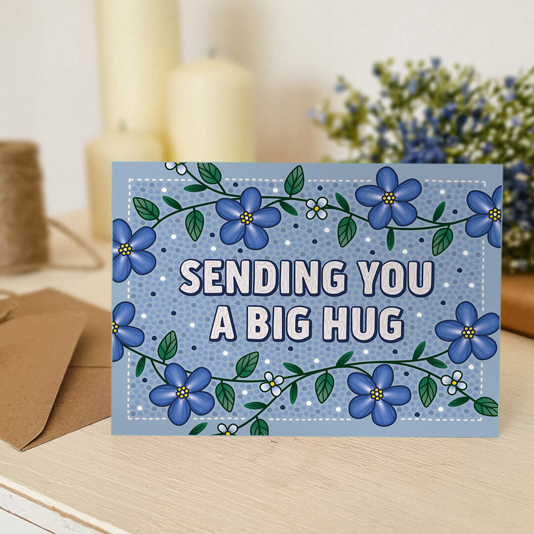 blue thinking of you card for friends Blue floral illustrations with sending you a big hug message Printed on FSC-certified card and supplied with a kraft brown recycled envelope