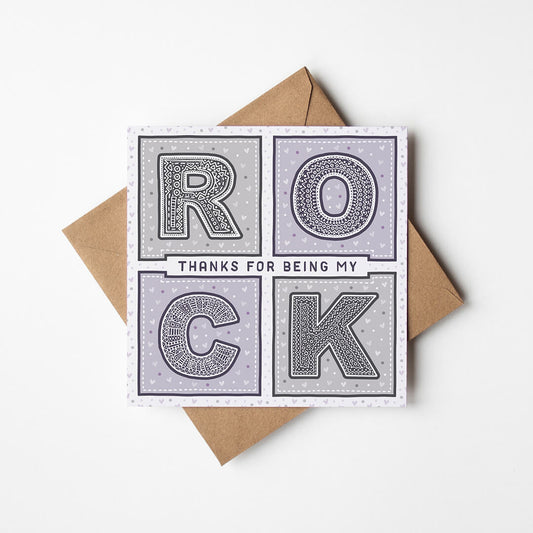 Delicate grey and purple typographic anniversary card with thanks for being my rock message Unique romantic and heartfelt anniversary card for husband Printed on FSC-certified card with a kraft brown recycled envelope Blank inside