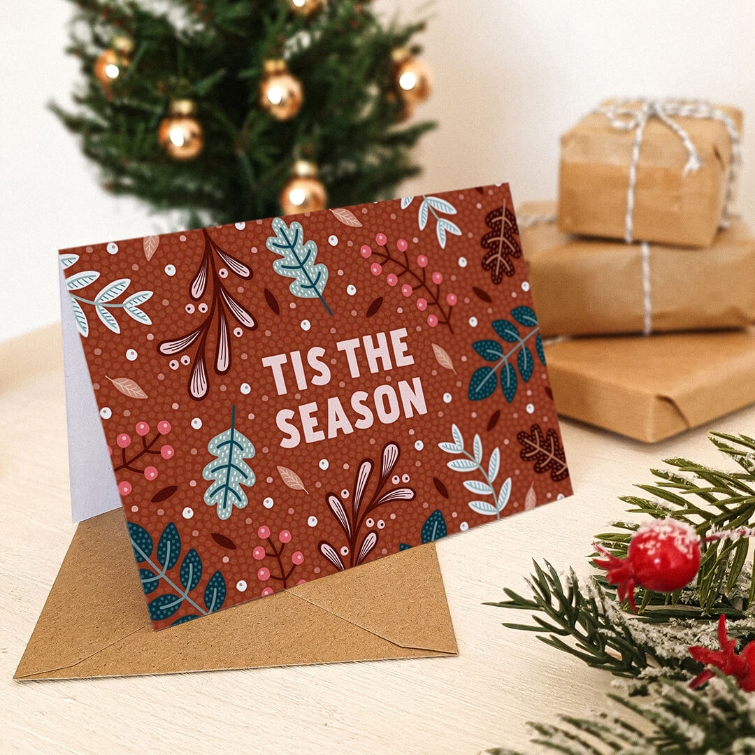 Unique tis the season red Christmas card featuring botanical illustrations Kraft Brown recycled envelope