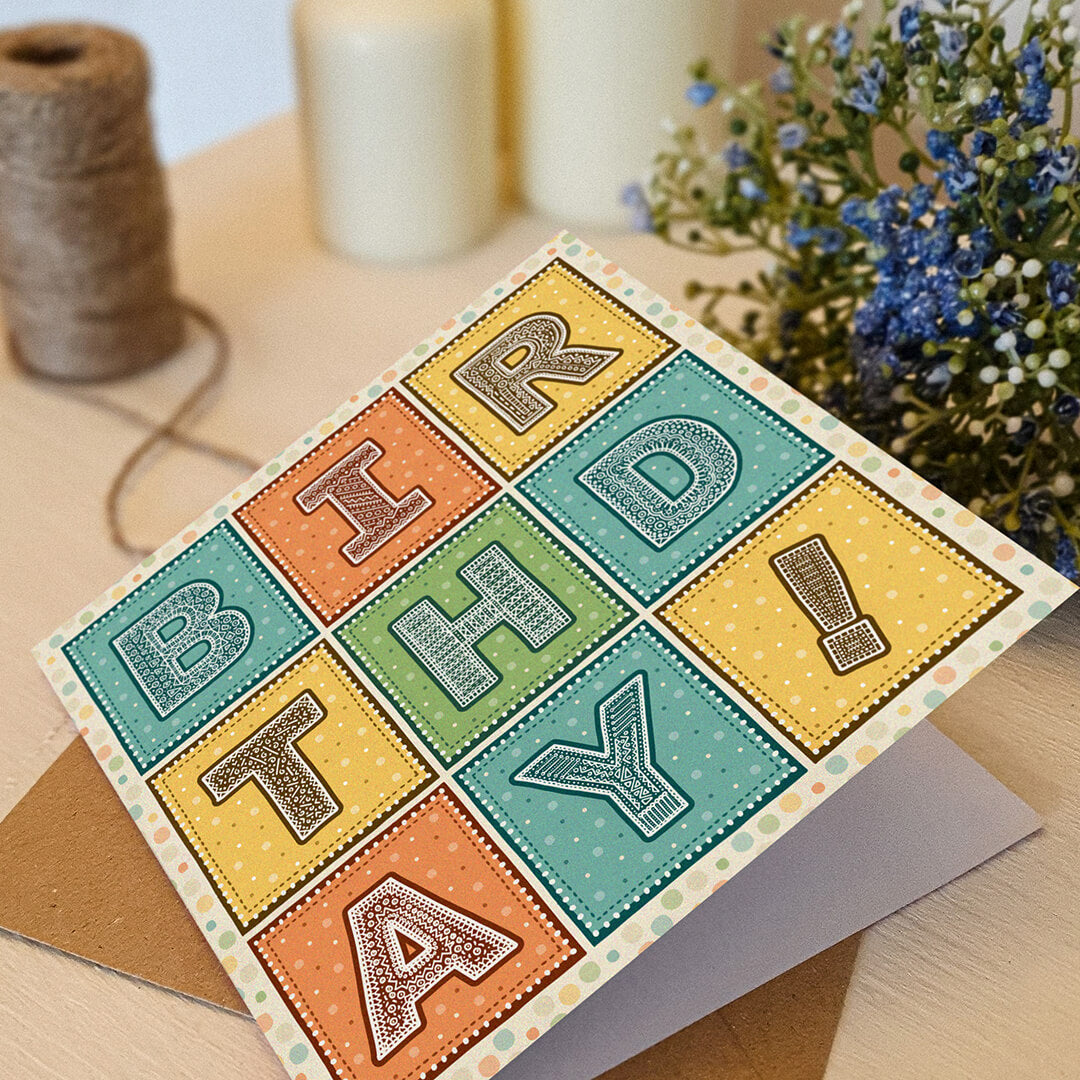 Fun and colourful birthday card for kids and friends Turquoise orange and yellow typographic birthday card Printed on FSC-certified card with kraft brown recycled envelope Blank inside