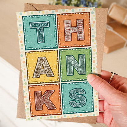 Turquoise orange and yellow typographic thank you card Fun and colourful thank you card Printed on FSC-certified card with kraft brown recycled envelope Blank inside