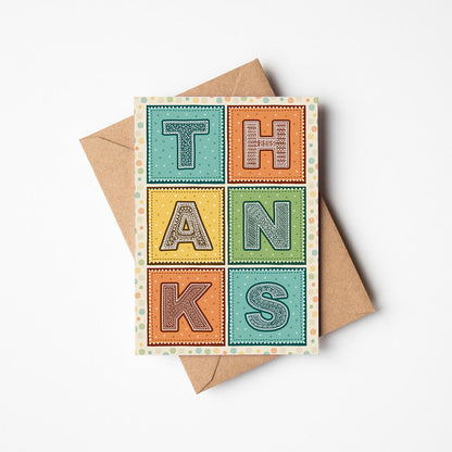 Turquoise orange and yellow typographic thank you card Unique fun and colourful thank you card Printed on FSC-certified card with kraft brown recycled envelope Blank inside