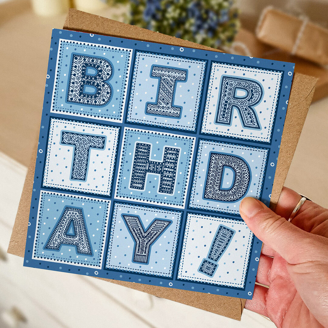 blue typographic birthday card Part of the unique colourful birthday card multipack Blank inside Supplied with kraft brown recycled envelopes