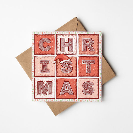 Red Christmas card with 'CHRISTMAS' text and a Santa hat illustration on a white background