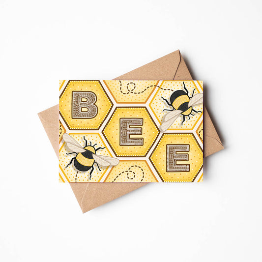 Bee greeting card with bee illustrations, detailed typography and honeycomb design on a white background