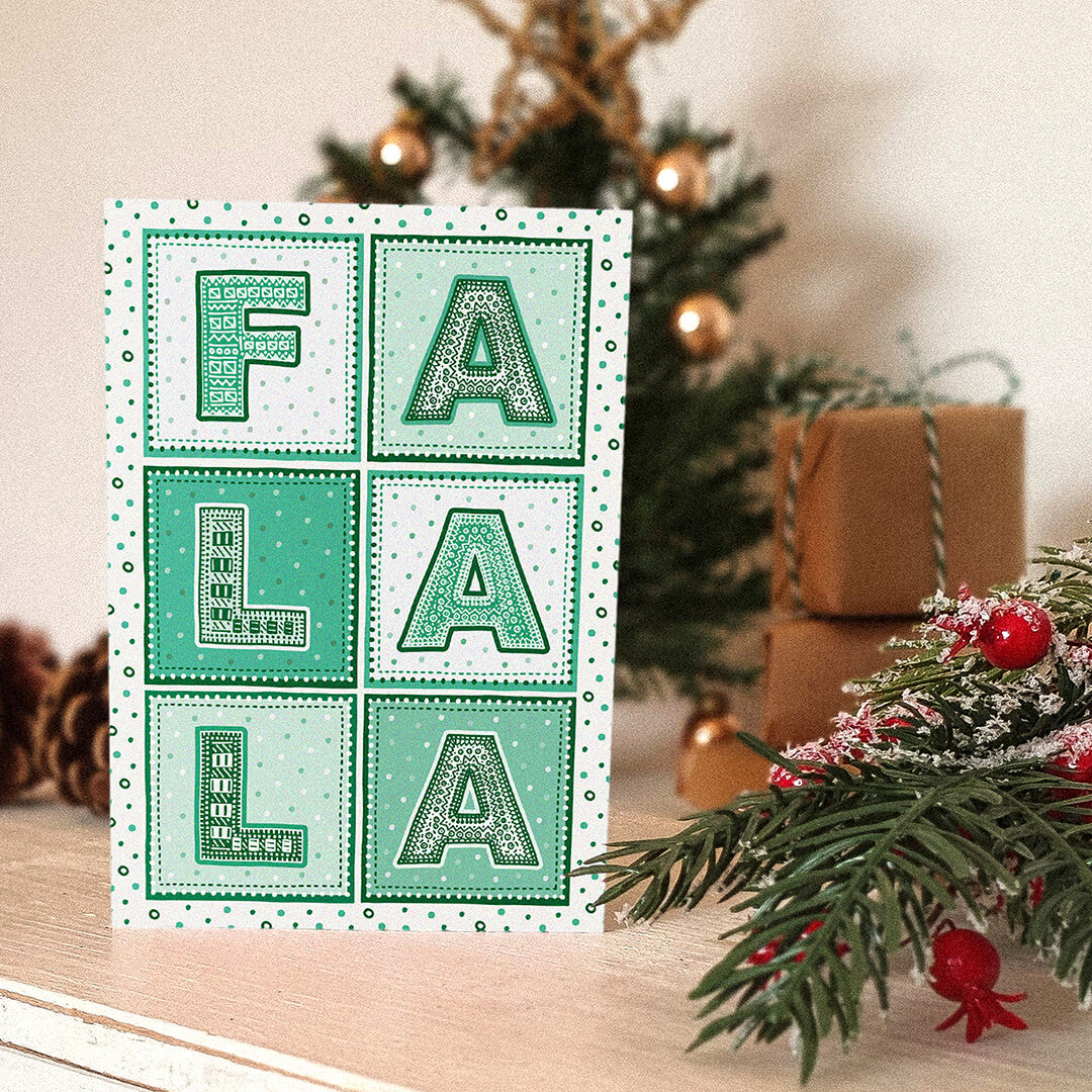 Green typographic Fa La La Christmas card Modern typographic Christmas card design Printed on recycled card Kraft brown recycled envelope