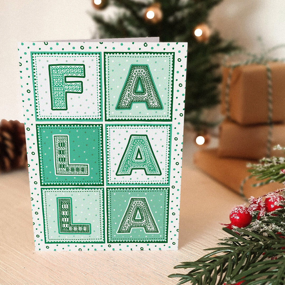 Typographic Fa La La Christmas card Kraft Brown recycled envelope Green modern contemporary Christmas card design